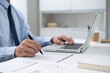 © Charlie's - Business man working by using laptop computer Hands typing on a keyboard. Professional investor working new start up project. business planning in office. Technology business