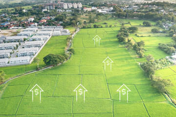 Wall Mural - Land value in aerial view consist of landscape of green field or agriculture farm, residential or house building in village, up arrow of rate market price. Real estate or property for sale, investment