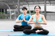 © kunchainub - healthy man and woman yoga exercise for relax health yoga class sport exercise together with happy moment and balance fit bidy on yoga mat fitness