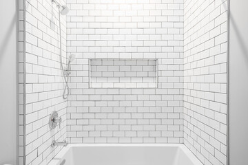 Wall Mural - Modern and Minimal Clean White Bathroom. White Subway Tile Shower with Stainless Steel Hardware. 