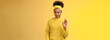 Okay not bad. Portrait devious serious-looking confident african-american bossy girl check out nice work done show ok gesture smug approval agree like good job, standing yellow background pleased