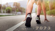 © tanakorn - Beginning new year 2023 concept of planning goals, objectives and challenges or career path, business strategies, opportunities and changes.