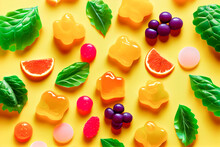Assorted Jelly Gum Fruit Candy On Yellow Background Top View. Generative AI.