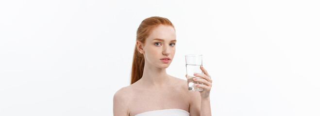 Wall Mural - Health, people, food, sports, lifestyle and beauty content - Smiling Young Woman with glass of Water.