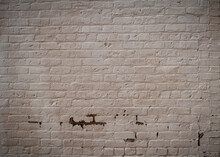 Panorama Of Brick Wall Painted Gray With Areas Of Peeling Paint, Creative Copy Space, Horizontal Aspect