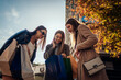 © qunica.com - Beautiful ladies looking at their shopping bags