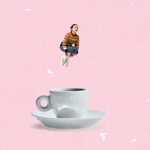 Contemporary Art Collage. Creative Design. Young Woman In Cozy Sweater Jumping Into Cup With Coffee Over Light Pink Background