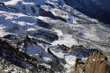 Viewpoint from the Aiguille du Midi which  is a 3,842-metre-tall mountain in the Mont Blanc massif within the French Alps