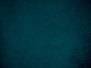 dark blue velvet fabric texture used as background. tone color blue cloth background of soft and smo