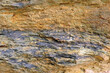 © E-lona - A brown and orange sedimentary rock containing sulfur and pyrite