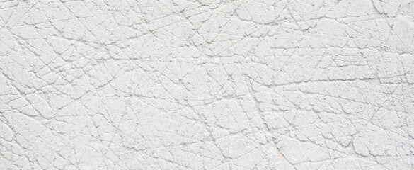 Wall Mural - White or light gray rough scratched concrete texture background