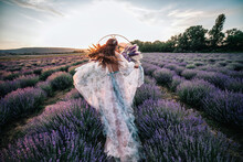 Beautiful Bride In A Lavender Field At Sunset. 