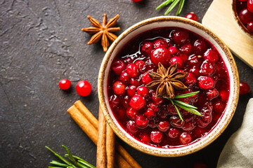 Wall Mural - Cranberry sauce in a bowl top view.