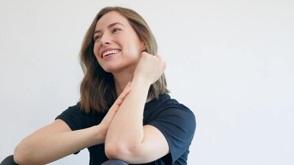 Wall Mural - Video of smiling brunette woman and girl looking in camera feeling happy looking beautiful. Casual girl in black t-shirt isolated on white background 