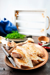 Sticker - Fresh raw fish fillet with spices, pepper, salt, basil on a stone plate, top view, square