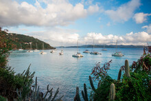 BRITISH VIRGIN ISLANDS, CARIBBEAN. Sailboats Anchored In A Quiet Cove Of The Caribbean Islands.