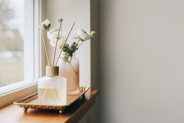 air freshener perfume diffuser near the window