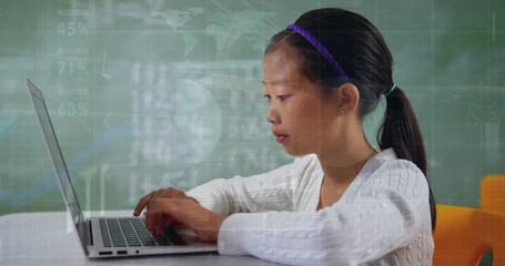 Wall Mural - Animation of financial data processing over biracial schoolgirl using laptop in class