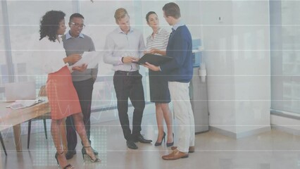 Canvas Print - Executives discussing a document in an office, with animation of financial graphs and data overlaid 