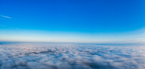 Wall Mural - A wonderful dawn above the clouds. Natural background