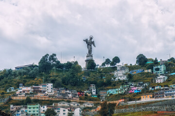 Virgen de Quito (Madonna of Quito) statue and neighborhood on El Panecillo hill, Quito, Ecuador.