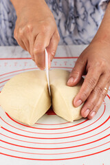 Female Hand Divided Bread or Pizza Dough into Smaller Pieces, Step by Step Making Bread