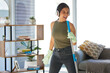 © Kirsti D/peopleimages.com - Cleaning, singing and black woman listening to music for fun, energy and happiness with excited dance, mop and broom in living room. Happy cleaner, headphones and radio, audio streaming and karaoke
