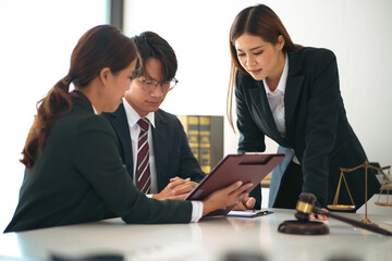 Wall Mural - Lawyer preparing to sign a contract reading documents at meeting