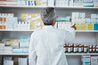 © C Daniels/peopleimages.com - Pharmacy pills, pointing and senior pharmacist with product choice, medicine box or pharmaceutical medication drugs. Retail medical store, healthcare and back of elderly woman point at shop shelf