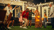 © Gorodenkoff - Group of Multicultural Diverse Friends and Relatives Having Fun and Dancing Together at an Evening Garden Party. Beautiful and Handsome Young and Old People Having Fun.