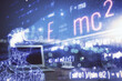 © peshkova - Desktop computer background and formula hologram writing. Double exposure. Education concept.