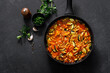 Leinwandbild Motiv Chickpea and zucchini saute with carrot and garlic. Classic italian side dish. Top view