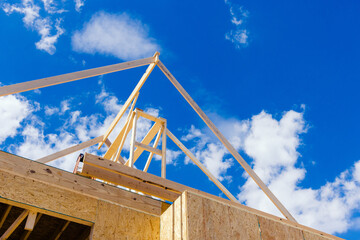 New family house construction begins with frame work.