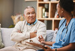 © C Davids/peopleimages.com - Consulting, medical and checklist with old man and nurse for retirement, rehabilitation or physical therapy. Help, empathy and healing with patient and black woman in nursing home for healthcare exam