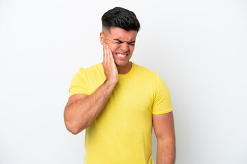 Wall Mural - Young caucasian handsome man isolated on white background with toothache