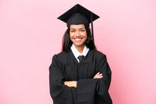 Young University Colombian Woman Graduate Isolated On Pink Background Keeping The Arms Crossed In Frontal Position