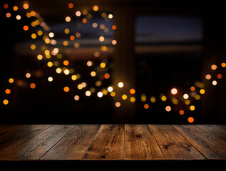 Wall Mural - Festive, Christmas, New Year background. Evening. Night. 
 Homely, cozy background. Abstract background. A wooden table on the background of a window with a night view and golden garlands. Bokeh. 