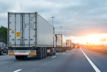 Lorry Trucks Cars In Traffic Jam At Border Zone Custom, Sunset Time.