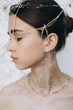 © Ananass - stylish portrait of a young 15-year-old model girl with natural light in a spacious photo studio
