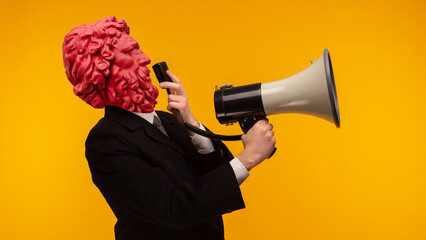 Abstract modern collage. The man with the plaster head of David with a megaphone on yellow background