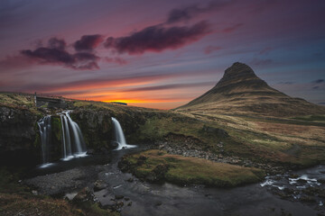  kirkjufellsfoss waterfall in iceland during sunset. Landscape, nature and scenery concept.