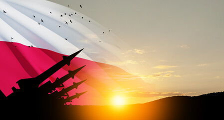 Wall Mural - The missiles are aimed at the sky at sunset with Polish flag. Nuclear bomb, chemical weapons, missile defense, a system of salvo fire.