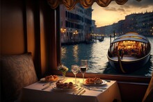 A Table With A Plate Of Food And A Glass Of Wine On It In Front Of A Window Overlooking A Canal At Night Time With Boats And Buildings In The Distance.