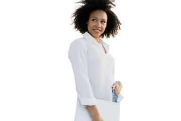 Wall Mural - A curly-haired woman in a white shirt, holding a laptop, isolated transparent background.