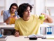 © Elnur - Two male students in the classroom