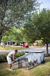 © Cavan Images - Locally sourcing food is a growing trend and chicken coops are rising in popularity throughout the US. Here, a chicken coop in the backyard of a family in Texas.