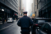 American Police Officer On The Street In New York City