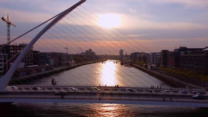 Wall Mural - Samuel Beckett Bridge over River Liffey in Dublin - aerial view by drone