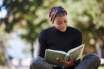 Black woman, reading book or nature park, garden or environment field in college, university or school study. Student, notebook or campus graduate with learning goals, education target or scholarship