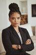 Portrait, black woman and leader arms crossed, manager and serious look in office. African American female, ceo or entrepreneur for business, employee and corporate deal for company, career or vision